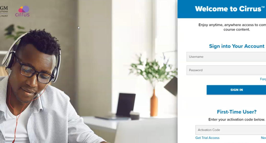 Login Screen for Cirrus 2.0 featuring a male student completing coursework